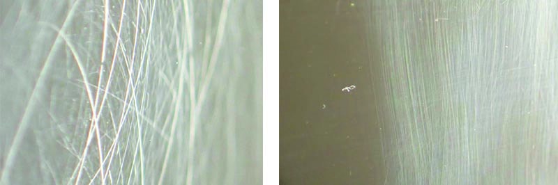 Scratches on Plexiglass from powdered carpet deodorizer testing.